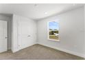 Cozy bedroom with natural light and a large closet at 6919 Five Oaks Dr, St Cloud, FL 34773