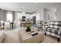 Inviting living space featuring an open floor plan, modern decor, and comfortable seating arrangements at 1624 Covey Rise Ter, Winter Haven, FL 33884