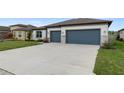 Beautiful single Gathering home with well manicured lawn and two car garage at 9773 Sw 63Rd Loop, Ocala, FL 34481