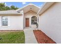 Inviting front porch with a nicely landscaped yard at 12 Almond Ter, Ocala, FL 34472