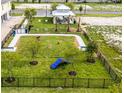Overhead view of the dog park with an obstacle course and gazebo with benches for relaxation at 1145 Red Buckeye Ct, Deland, FL 32720
