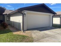 Attached garage with off-street parking at 2488 Hartridge Point W Dr # 2488, Winter Haven, FL 33881