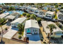 Waterfront manufactured homes feature boat docks and beautifully landscaped yards in a sunny coastal community at 9000 Us Highway 192 # 242, Clermont, FL 34714