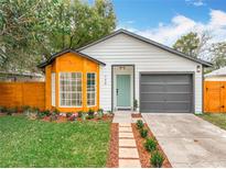Close up showing home's details and tidy landscaping at 748 Neuse Ave, Orlando, FL 32804