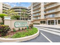 Attractive community signage and landscaping welcomes you to Cloverleaf North Condominiums at 4 Oceans West Blvd # 502B, Daytona Beach, FL 32118