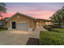Charming single-story home with well-manicured landscaping and a paved driveway at 8166 Sw 80Th Ter, Ocala, FL 34476