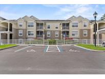 Beautiful two-story condo with balconies and handicap parking spaces in the front at 584 Brantley Terrace Way # 200, Altamonte Springs, FL 32714