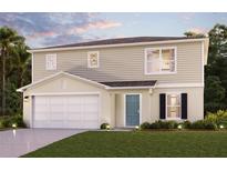 Charming two-story home featuring a symmetrical facade, attached two-car garage, and a well-manicured lawn at 812 Provence Way, Kissimmee, FL 34759