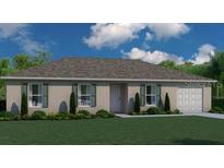 Charming single-story home with well-manicured lawn, two windows, and an attached garage at 1628 Redfin Dr, Poinciana, FL 34759