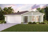 Charming single-story home boasts manicured lawn, attached two-car garage, and inviting front entrance at 2460 Nw 23Rd Ave, Ocala, FL 34475