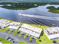 Waterfront condos boast stunning river views, lush landscaping, and convenient parking at 50 Ocean Palm Villa S, Flagler Beach, FL 32136