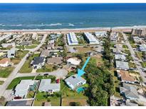 Aerial view of a single-Gathering home near the beach with a pool at 6 Baytree Cir, Ormond Beach, FL 32176