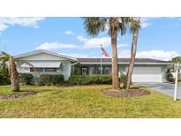 Charming single-story home with well-maintained landscaping, a two-car garage, and a welcoming facade at 4 Water Oak Cir, Ormond Beach, FL 32176