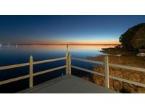 Enjoy beautiful lake views from the expansive dock in this waterfront community at 3130 Indian Trl, Eustis, FL 32726
