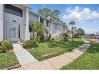 Charming townhome with landscaped front yard and a welcoming entrance at 129 Golden Eye Dr # C, Daytona Beach, FL 32119