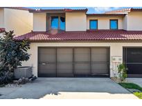 Beautful garage with tile roof and a secure entrance to home for peace of mind at 2934 Oceans Trce, Daytona Beach Shores, FL 32118