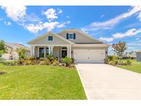 Charming single-Gathering home with well-manicured lawn and inviting curb appeal in a bright and sunny neighborhood at 2836 Monaghan Dr, Ormond Beach, FL 32174
