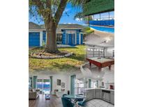 Bright blue house with well-manicured lawn and large tree at 1150 Angela Ridge Ct, Kissimmee, FL 34747