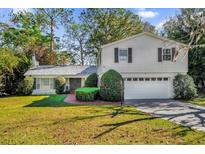 Beautiful ranch home with a spacious yard and two-car garage at 7470 Lake Marsha Dr, Orlando, FL 32819