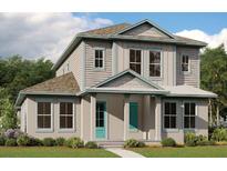 Two-story house with light gray siding, teal door, and a grassy lawn at 10221 Medawar St, Orlando, FL 32827