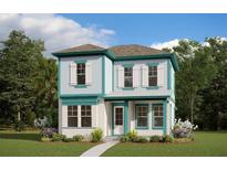 Two-story home with teal accents and a landscaped lawn at 9918 Fiddley Aly, Orlando, FL 32827