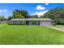 Ranch style home with a large yard at 2010 Hollywood Dr, Leesburg, FL 34748