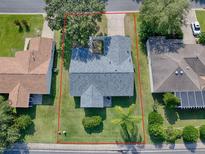 Aerial view showcasing house and surrounding landscape at 1930 Harston Trl, The Villages, FL 32162