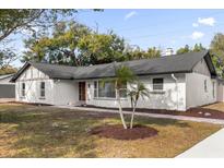 Newly renovated single-story home with a gray roof and landscaped yard at 1238 Cheetah Trl, Winter Springs, FL 32708