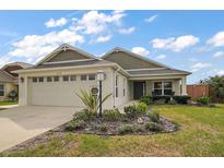 Beautiful single-Gathering home with landscaped yard and a two-car garage at 2184 Locklin Ln, The Villages, FL 32163