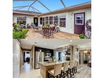 Spacious screened patio with ample seating, perfect for enjoying the outdoors in comfort and style at 1131 Apple Ter, Leesburg, FL 34748