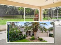 Charming single-story home boasts a two-car garage, and lush landscaping with a beautiful palm tree at 164 Palermo Pl, The Villages, FL 32159