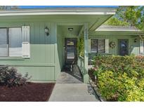 Charming home exterior with well-maintained landscaping and inviting front entrance at 628 Mount Homer Rd # 4B, Eustis, FL 32726
