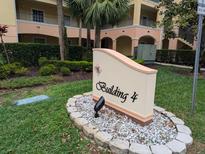 Close up view of the sign for Building 4 in this well-maintained condominium community at 8801 Worldquest Blvd # 4203, Orlando, FL 32821
