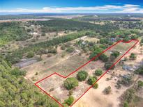 Expansive property outlined in red, showcasing the vast land and potential for development or recreation at 13013 County Road 561A, Clermont, FL 34715