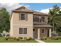 Charming two-story home with a neutral color scheme, symmetrical design, and manicured landscaping at 5173 Waypointe Blvd, Apopka, FL 32712