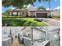 Charming one-story home with a well-manicured lawn, lovely landscaping, and a two-car garage at 1554 Sarus Ave, Groveland, FL 34736