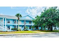Charming two-story condo with private balconies and beautiful landscaping at 3107 Sun Lake Ct # A, Kissimmee, FL 34747