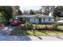 Charming single-story home featuring a well-maintained lawn and mature landscaping at 1202 Deidrich Ct, Eustis, FL 32726