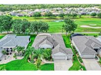 Gorgeous home situated on lush green golf course with scenic views and mature trees at 3681 Arlington Ridge Blvd, Leesburg, FL 34748