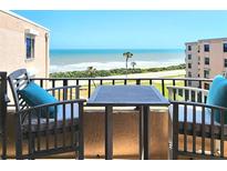 Relaxing balcony offers stunning ocean views with seating, perfect for enjoying the coastal scenery at 3370 Ocean Shore Blvd # 5020, Ormond Beach, FL 32176