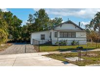 Cute bungalow with fenced yard, paved driveway, and updated exterior at 412 2Nd Sw St, Winter Haven, FL 33880