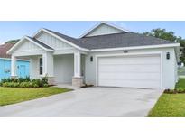 Inviting single-Gathering home with a two-car garage and a well-maintained lawn at 4545 Fairway Oaks Dr, Mulberry, FL 33860