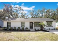 Newly renovated home with modern exterior and landscaping at 1418 Grace N St, Lakeland, FL 33810