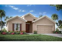 Single-story home with a light beige exterior, brown accents, and a two-car garage at 1104 Mountain Flower Ln, Davenport, FL 33837