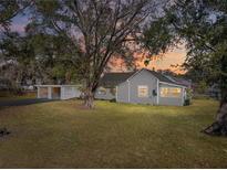 Charming house with a spacious yard, and carport at 702 Nw 1St Ave, Mulberry, FL 33860