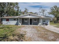 Charming single-story home with a covered front entrance and freshly painted exterior at 808 Spirit Lake Rd, Winter Haven, FL 33880