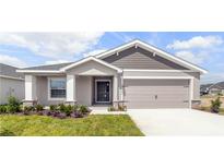 Charming single-story home with well-maintained lawn and a welcoming two-car garage at 4522 Rapallo Ave, Winter Haven, FL 33884