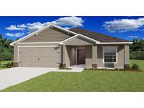 Charming single-story home featuring a well-manicured lawn, neutral color palette, and an attached two-car garage at 4522 Rapallo Ave, Winter Haven, FL 33884