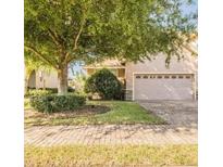 Charming single-Gathering home featuring a two-car garage and mature landscaping at 6397 Torrington Cir, Lakeland, FL 33811