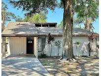 Charming single-story home with a well-maintained front yard and mature trees at 4641 Devon Ave, Lakeland, FL 33813